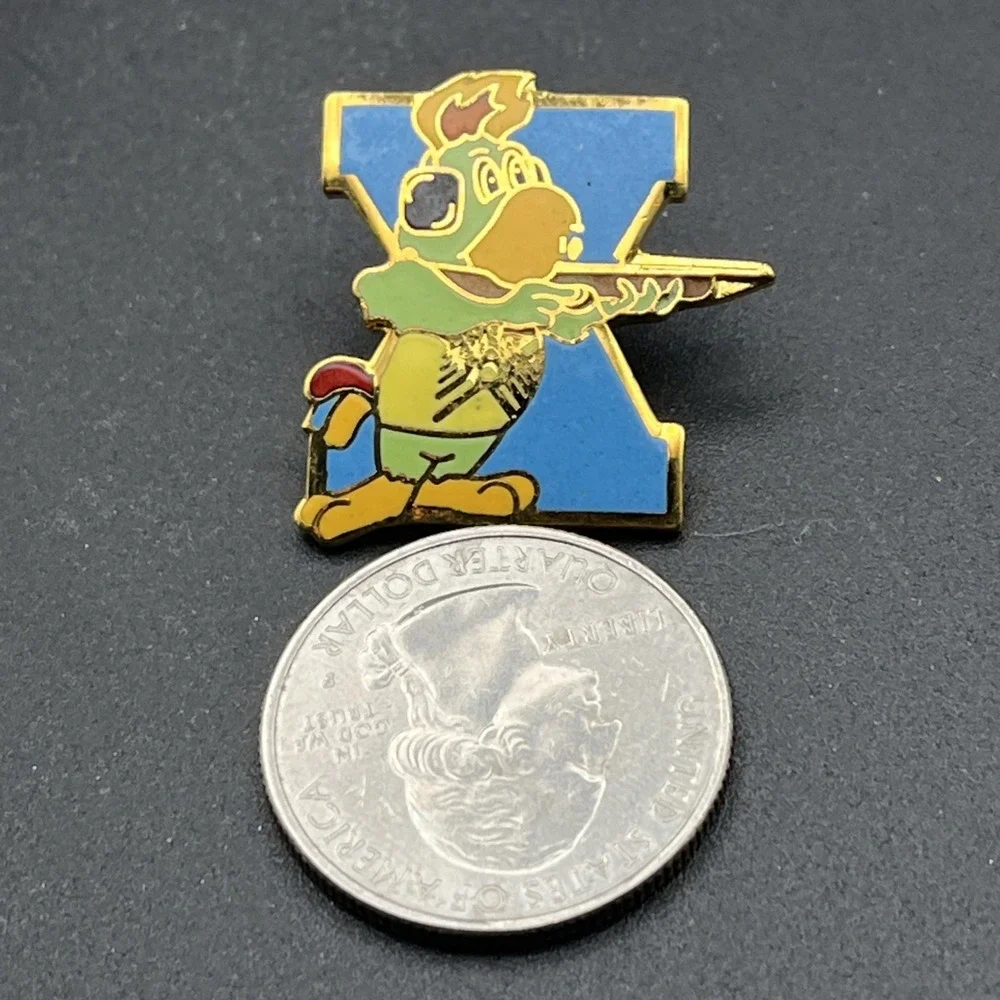 1987 Tenth Pan American Games Marsh Amigo Mascot Shooting Event Lapel‎ Hat Pin